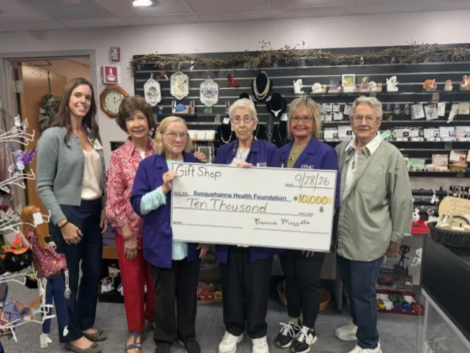 Divine Providence Gift Shop donates $10,000 to support patient care and grief services